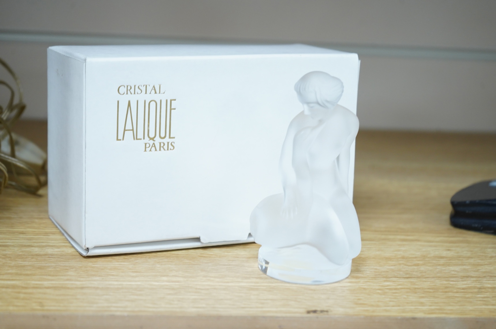 A Lalique frosted glass figurine of Leda and the Swan, signed to the base, boxed, 11.5cm high